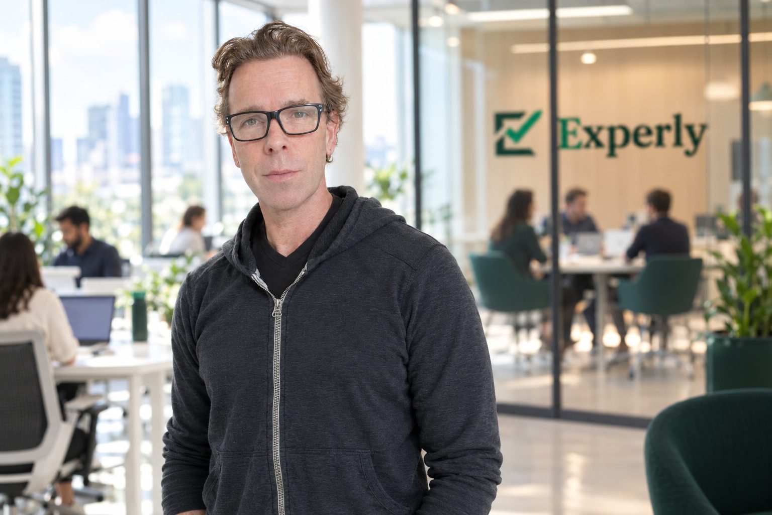 Jason Jacobson in the Experly office, natural light